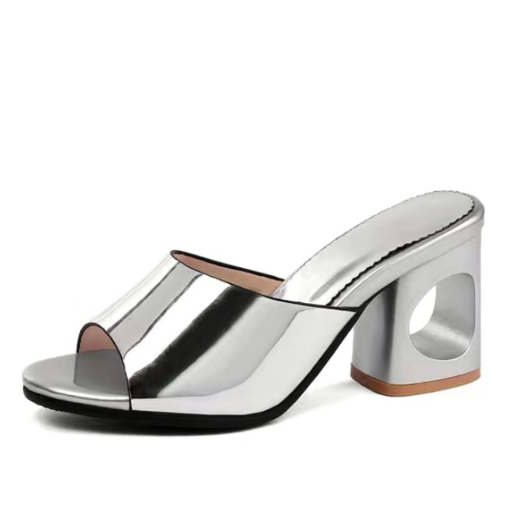 Sculptural silver heels size 7.5